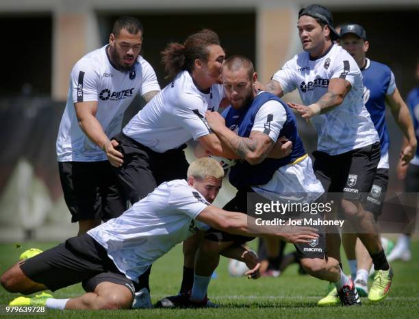 Jared Waerea-Hargreaves of the New Zealand Kiwis rugby team is tackled during a training session at University of Denver on June 20, 2018 in Denver,...
