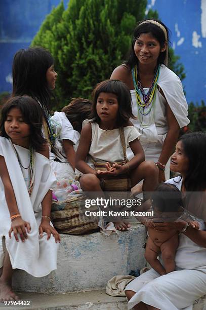 Kogui family sits in a park in Tairona, Sierra Nevada of Santa Marta region of Colombia. The Kogui or Kogi or Kaggabba, translated "jaguar" in the...