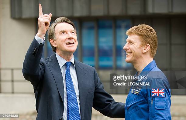British Business Secretary Peter Mandelson speaks to Timothy Peake of the European Astronaut Corps outside in central London, on March 23, 2010....