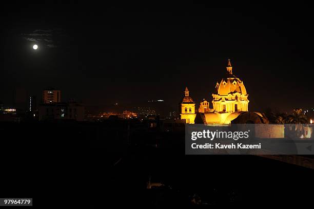 Of INDIAS, COLOMBIA Night scene with full moon inside the old city. Cartagena de Indias was founded on 1 June 1533 by Spanish commander Pedro de...