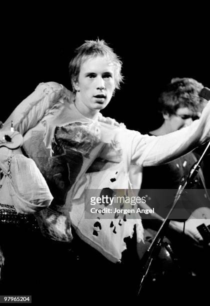 Johnny Rotten of The Sex Pistols performs on stage at the nightclub Daddy's Dance Hall on July 13th 1977 in Copenhagen, Denmark.
