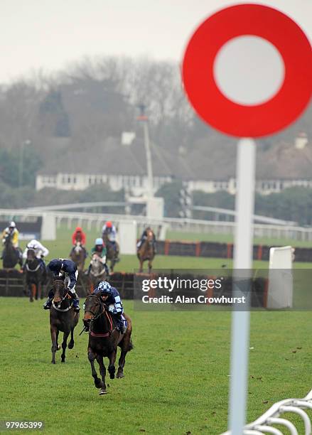 Captain Chris and Richard Johnson cruise to an easy victory in The Bet Multiples - Betdaq 'National Hunt' Novices' Hurdle Race at Kempton Park...