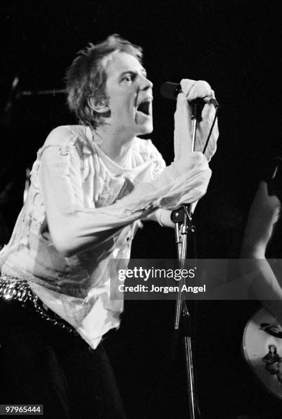 Johnny Rotten of The Sex Pistols performs on stage at the nightclub Daddy's Dance Hall on July 13th 1977 in Copenhagen, Denmark.