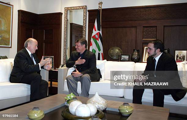 King Abdullah II of Jordan and his half brother Prince Ali bin al-Hussein , the chairman of the Jordan Football Association, meet with FIFA president...