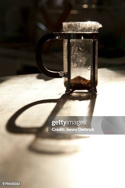 coffee plunger is sunlight - french press stock pictures, royalty-free photos & images