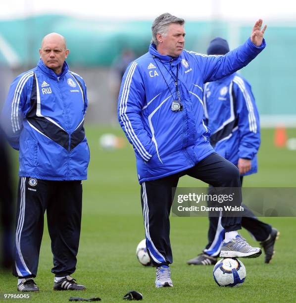 Chelsea manager Carlo Ancelotti and Ray Wilkins during a training session at the Cobham training ground on March 23, 2010 in Cobham, England.