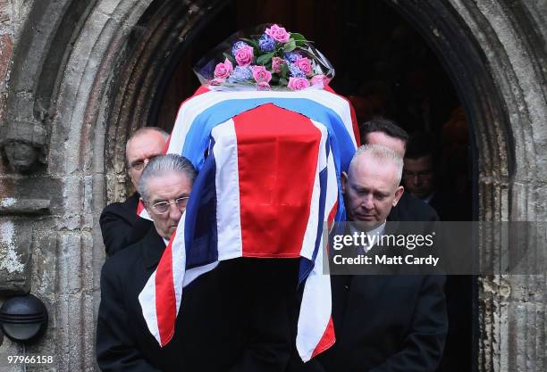 The coffin of French resistance heroine Andree Peel is carried from All Saints Church, Long Ashton on March 23 2010, in Bristol, England. Andree...