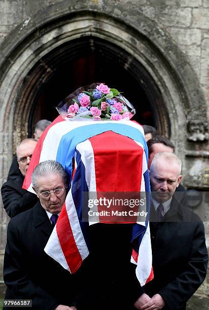 The coffin of French resistance heroine Andree Peel is carried from All Saints Church, Long Ashton on March 23 2010, in Bristol, England. Andree...