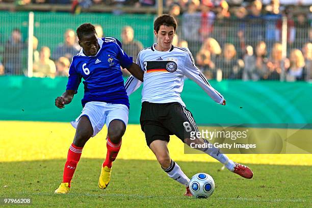 Akaki Gogia is challenged Christopher Missilou during the U18 international friendly match between Germany and France at the Arena Oldenburger...