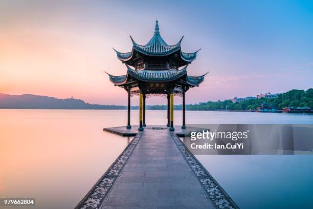 jixian pavilion of hangzhou west lake, china (dusk) - temple stock pictures, royalty-free photos & images