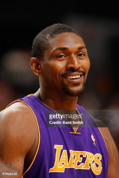 Ron Artest of the Los Angeles Lakers cracks a smile during the game against the Charlotte Bobcats on March 5, 2010 at the Time Warner Cable Arena in...