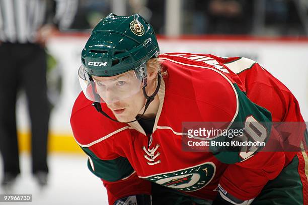 Antti Miettinen of the Minnesota Wild prepares for a face-off against the Edmonton Oilers during the game at the Xcel Energy Center on March 16, 2010...