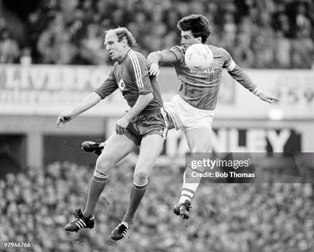 Dieter Hoeness of Bayern Munich jumps with Kevin Ratcliffe of Everton during the Everton v Bayern Munich European Cup Winners Cup Semi-Final 2nd leg...