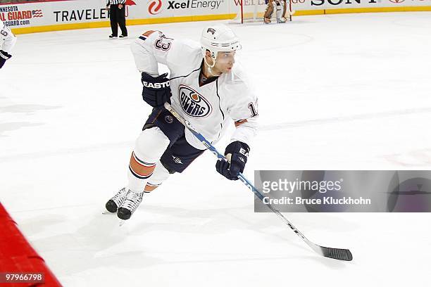 Andrew Cogliano of the Edmonton Oilers skates to the puck against the Minnesota Wild during the game at the Xcel Energy Center on March 16, 2010 in...