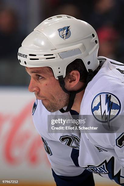 Martin St. Louis of the Tampa Bay Lightning lines up for a face off against the Florida Panthers at the BankAtlantic Center on March 21, 2010 in...