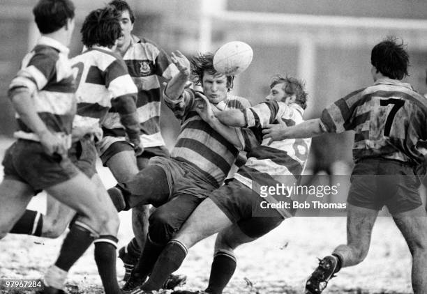 Andy Ripley of Rosslyn Park is pulled down by Peter Cook of Nottingham during the Nottingham v Rosslyn Park Rugby Union match played on a snow...