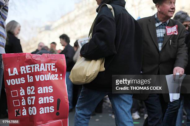 Several thousands people demonstrate on March 23, 2010 in Paris, as part of a nationwide day of protest against job cuts, wages, the high cost of...