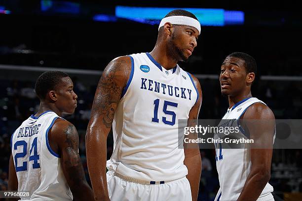 Eric Bledsoe, DeMarcus Cousins and John Wall of the Kentucky Wildcats during the game against the East Tennessee State Buccaneers during the first...