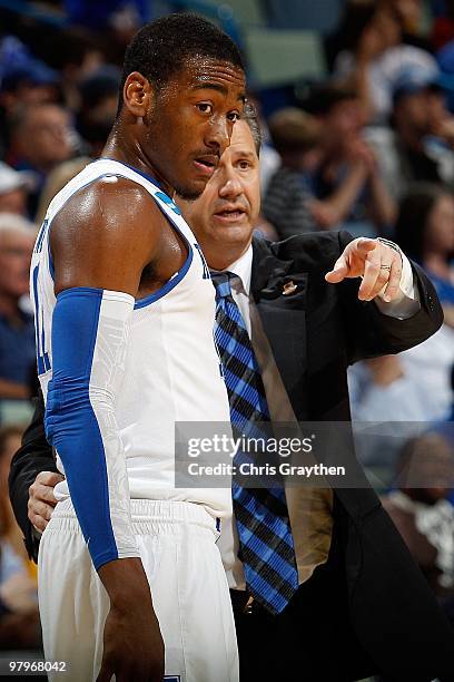 Head coach John Calipari and John Wall of the Kentucky Wildcats during the second round of the 2010 NCAA men's basketball tournament at the New...