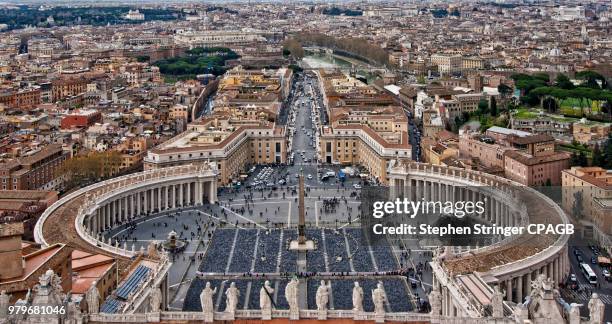 high angle view of st peters square, vatican, italy - st peters square stock-fotos und bilder