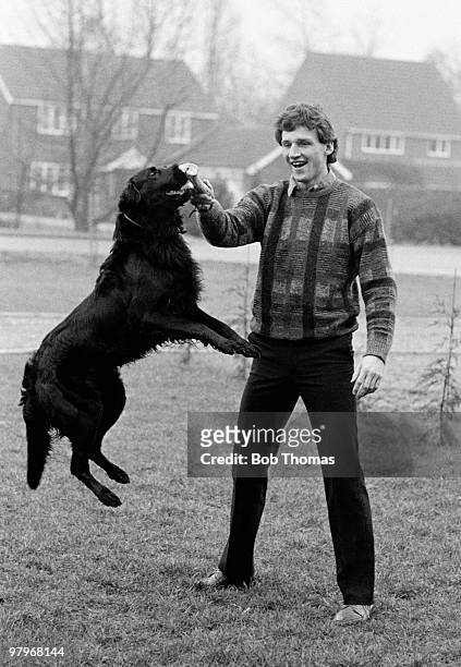 Norwich City Captain Dave Watson with his dog Rocky at home in Norwich, England on the 7th March 1985.