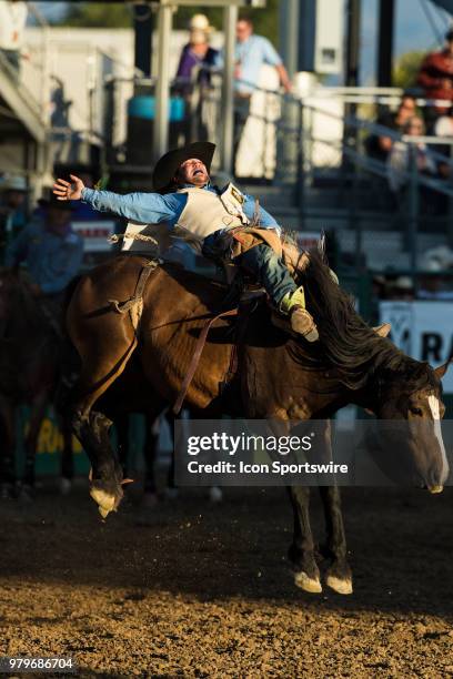 Tony Barrington rides Holly Time during the Bareback Bronco Riding event at the Reno Rodeo on Tuesday, June 19, 2018 at the Reno Livestock Events...