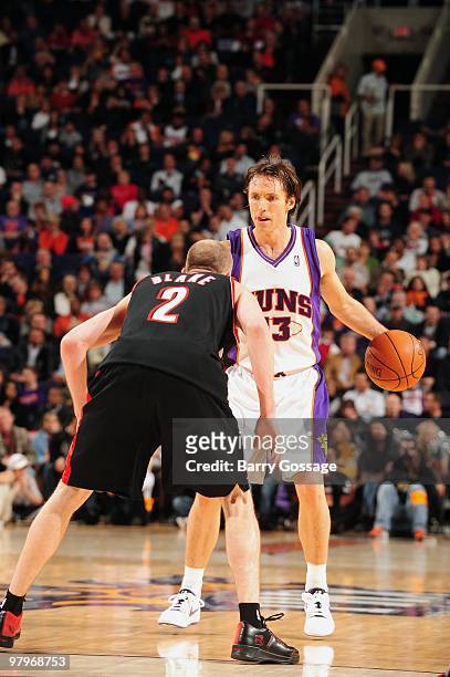 Steve Nash of the Phoenix Suns moves the ball against Steve Blake of the Portland Trail Blazers during the game on February 10, 2010 at U.S. Airways...