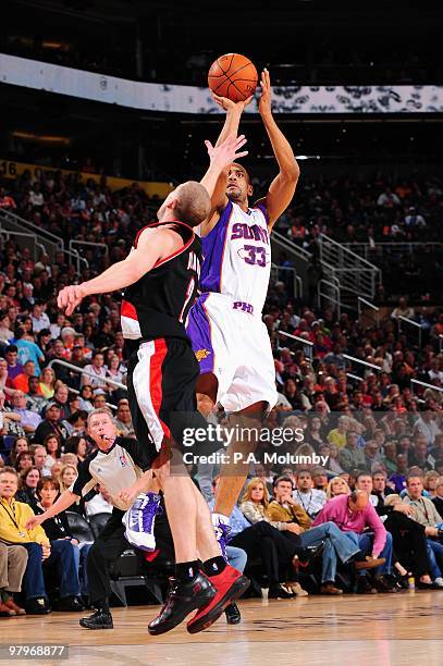 Grant Hill of the Phoenix Suns takes a jump shot against Steve Blake of the Portland Trail Blazers during the game on February 10, 2010 at U.S....