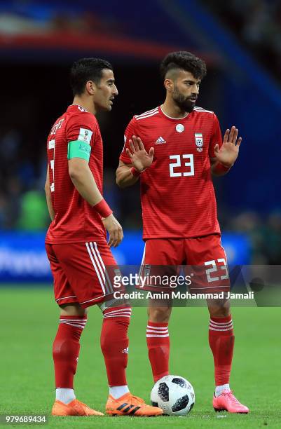 Ramin Rezaeian and Ehsan Haj Safi of Iran looks on during the 2018 FIFA World Cup Russia group B match between Iran and Spain at Kazan Arena on June...