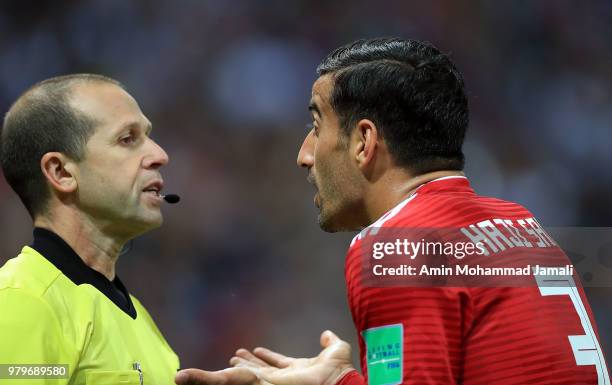 Ehsan Haj Safi of Irran speeks with referee during the 2018 FIFA World Cup Russia group B match between Iran and Spain at Kazan Arena on June 20,...