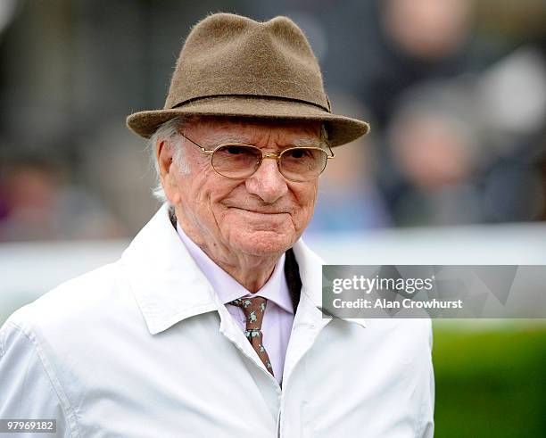 Former BBC racing commentator Sir Peter O'Sullevan looks on at Kempton Park racecourse on March 23, 2010 in Sunbury, England