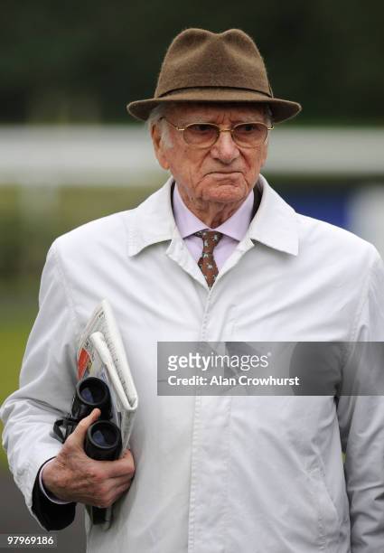 Former BBC racing commentator Sir Peter O'Sullevan looks on at Kempton Park racecourse on March 23, 2010 in Sunbury, England