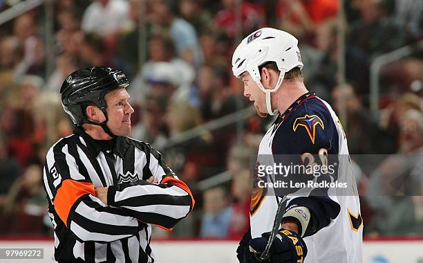 Referee Kerry Fraser exchanges a few words with Eric Boulton of the Atlanta Thrashers during a game against the Philadelphia Flyers on March 21, 2010...