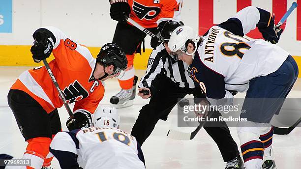 Mike Richards of the Philadelphia Flyers and Nik Antropov of the Atlanta Thrashers wait for the drop of the puck from Linesmen Darren Gibbs on March...