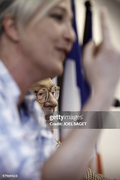 French far-right party Front National president and vice-president, Jean-Marie Le Pen and his daughter Marine give a press conference on March 23,...