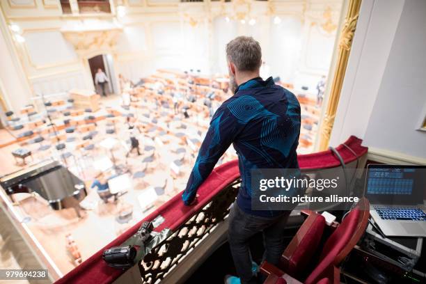 February 2018, Germany, Hamburg: Technician Alexandre Dietze wears a so-called 'Sound Shirt' before a concert of the Young Hamburg Symphony Orchestra...