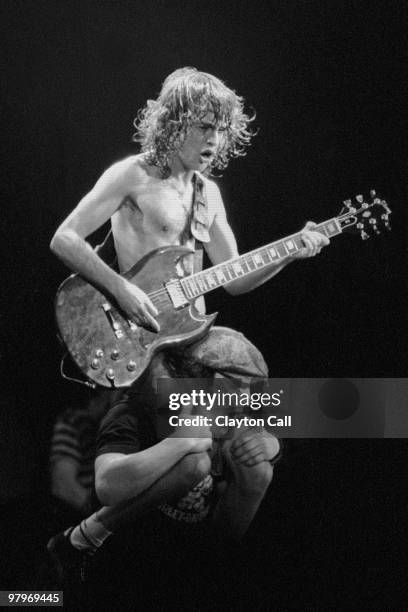 Brian Johnson and Angus Young from AC/DC perform live on stage at the Cow Palace in San Francisco on February 16, 1982