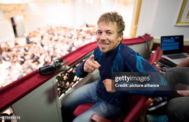 February 2018, Germany, Hamburg: Mischa Gohlke wears a so-called 'Sound Shirt' during a concert of the Young Hamburg Symphony Orchestra in the...