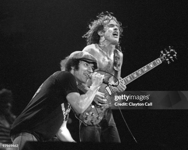 Brian Johnson and Angus Young from AC/DC perform live on stage at the Cow Palace in San Francisco on February 16, 1982