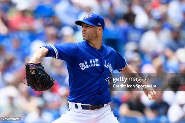 Toronto Blue Jays Starting pitcher J.A. Happ throws a pitch during the MLB regular season game between the Toronto Blue Jays and the Atlanta Braves...