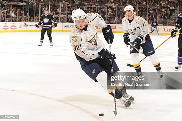 Cody Franson of the Nashville Predators skates with the puck against the Los Angeles Kings on March 14, 2010 at Staples Center in Los Angeles,...