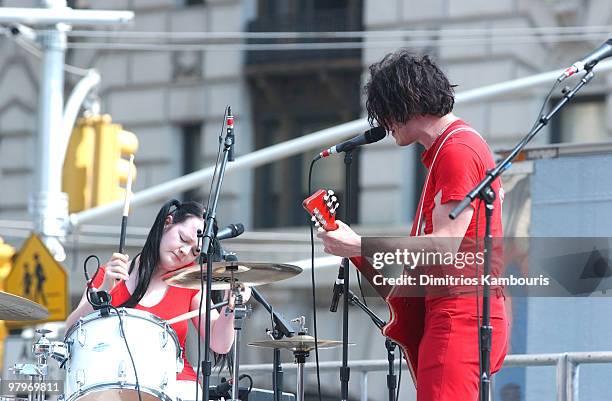 Meg and Jack White of The White Stripes perform