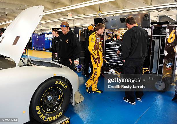 David Ragan, driver of the UPS Ford works with his crew during NASCAR Sprint Cup Series spoiler testing at Charlotte Motor Speedway on March 23, 2010...