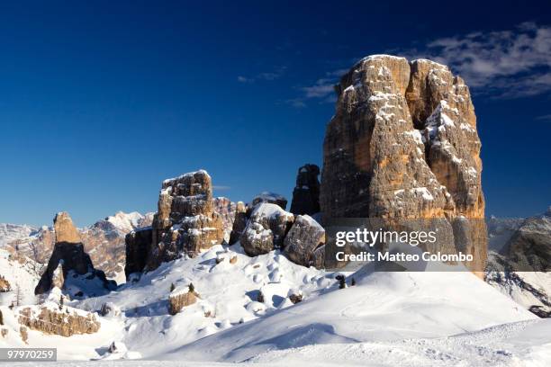 famous peak called ' cinque torri ' - cortina stock-fotos und bilder