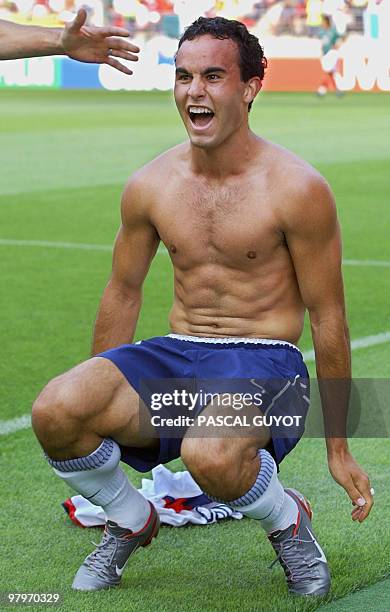 S Landon Donovan celebrates following his 65th minute goal, 17 June 2002 at the Jeonju World Cup Stadium in Jeonju, during second round playoff...