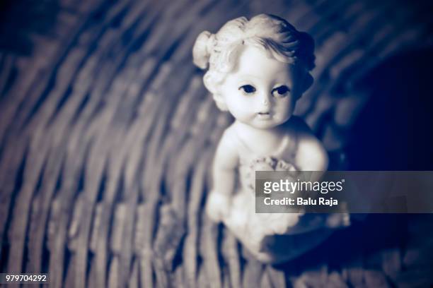 innocent/scary ?? - balu stock pictures, royalty-free photos & images