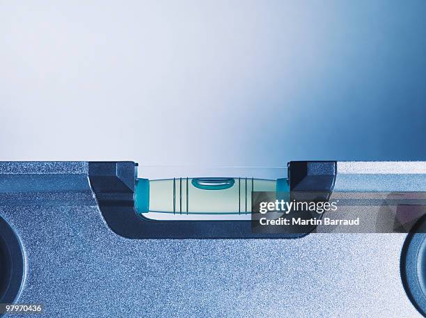 close up of level tool - waterpas stockfoto's en -beelden