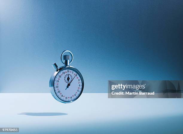 stopwatch floating - timer stock pictures, royalty-free photos & images