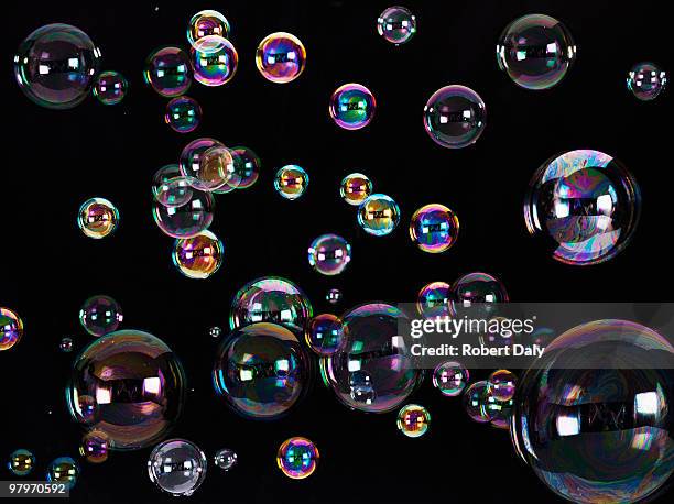 floating bubbles - bubble stock pictures, royalty-free photos & images