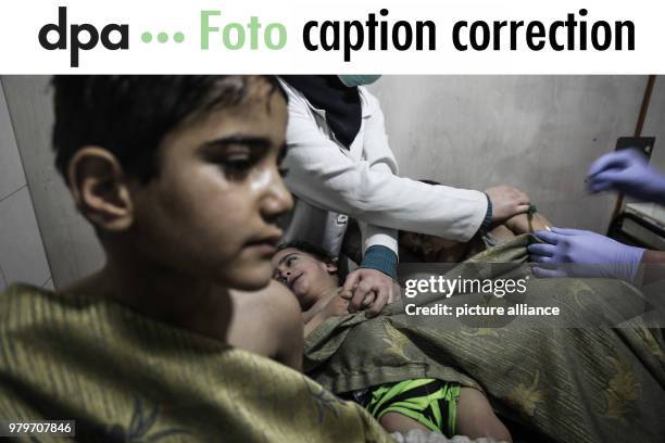 Dpatop - CAPTION CORRECTION: Headline and captions sent to you via FTP on 8 March 2018 of these images from Syria contain unproven statements of...